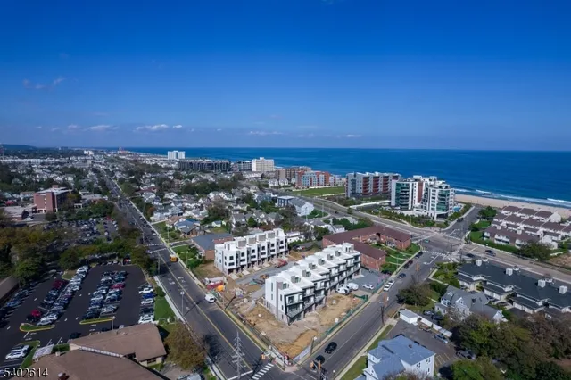 a view of a city and ocean view