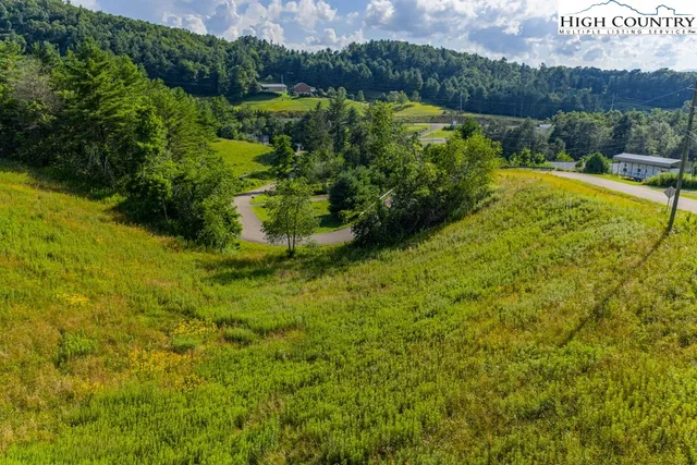a view of a large body of water with a mountain in the background