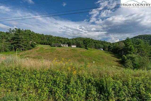 a view of a yard in front of a house
