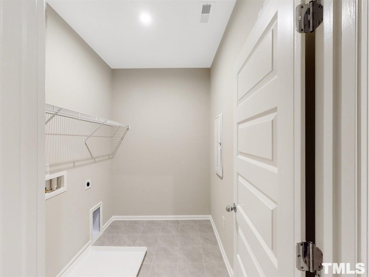 1605 Brussels Drive Apex, NC 27502 - Photo 10 of 17 a view of walk in closet