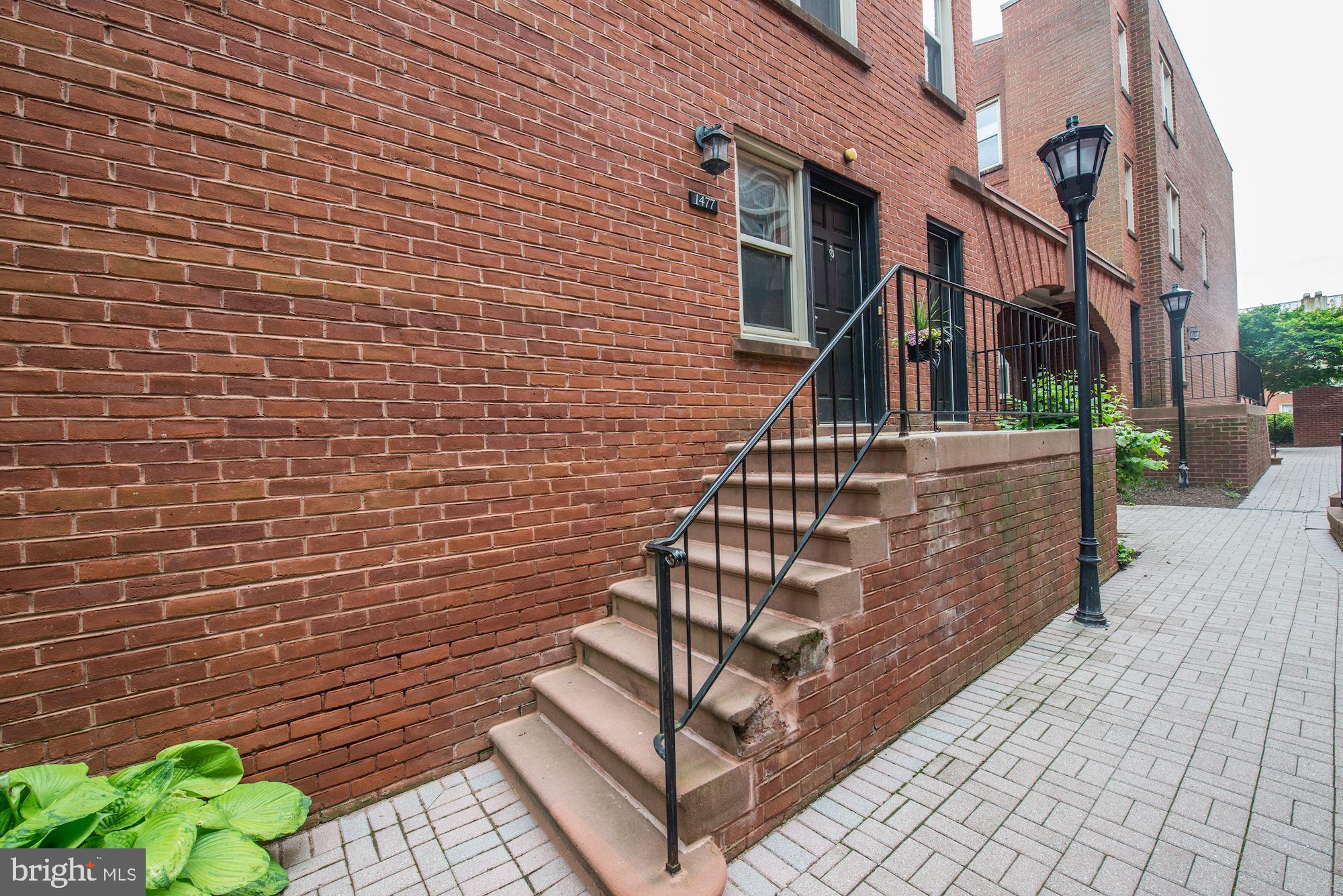 1477 A Street Northeast, Unit 1477 Washington, DC 20002 - Photo 1 of 27 Entrance and patio perfect for bistro table