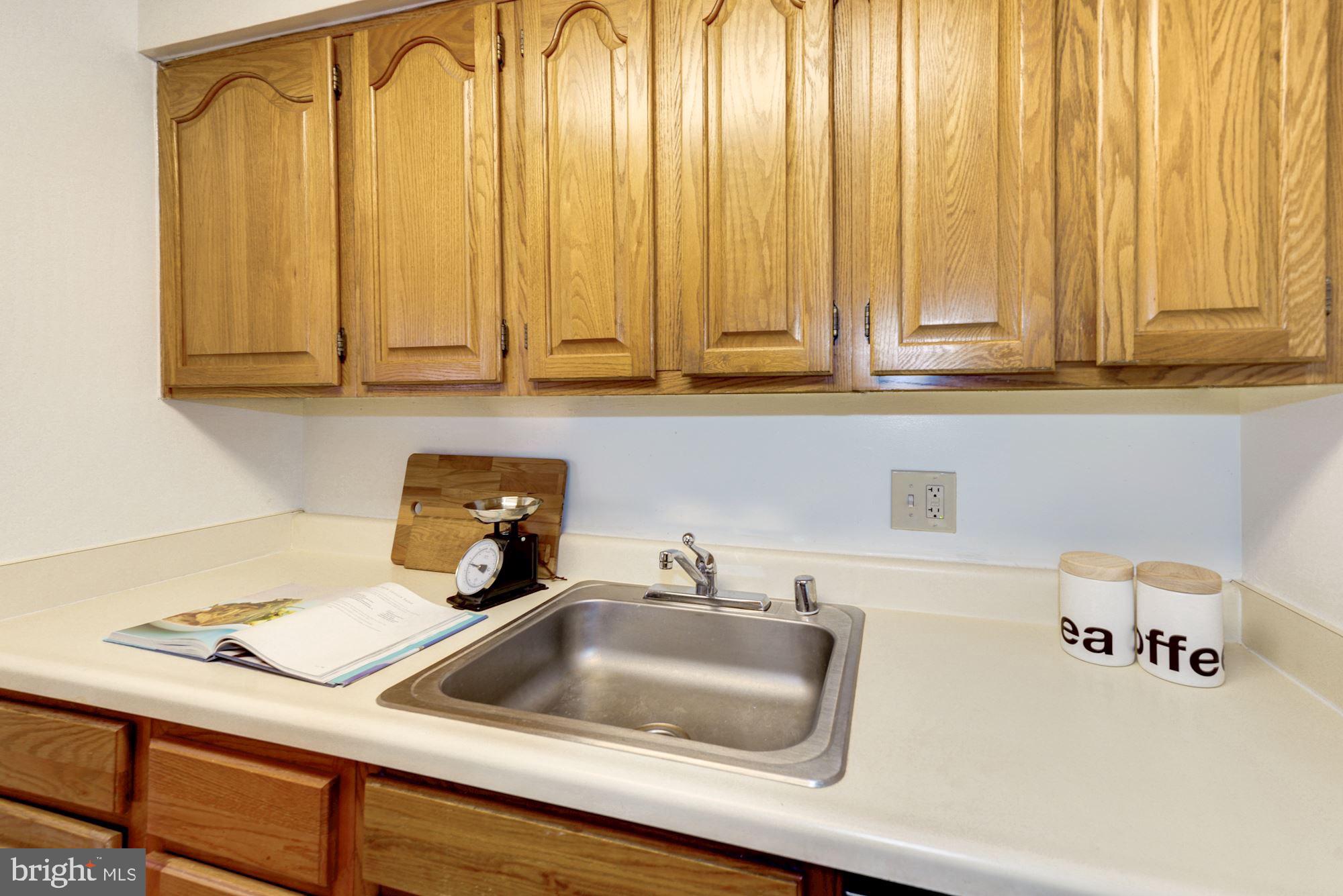 1477 A Street Northeast, Unit 1477 Washington, DC 20002 - Photo 12 of 27 Lots of storage in kitchen