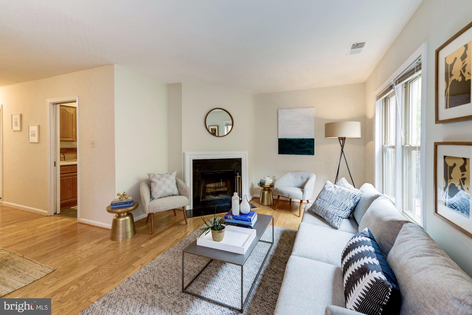 1477 A Street Northeast, Unit 1477 Washington, DC 20002 - Photo 5 of 27 Open Living Room with working fireplace