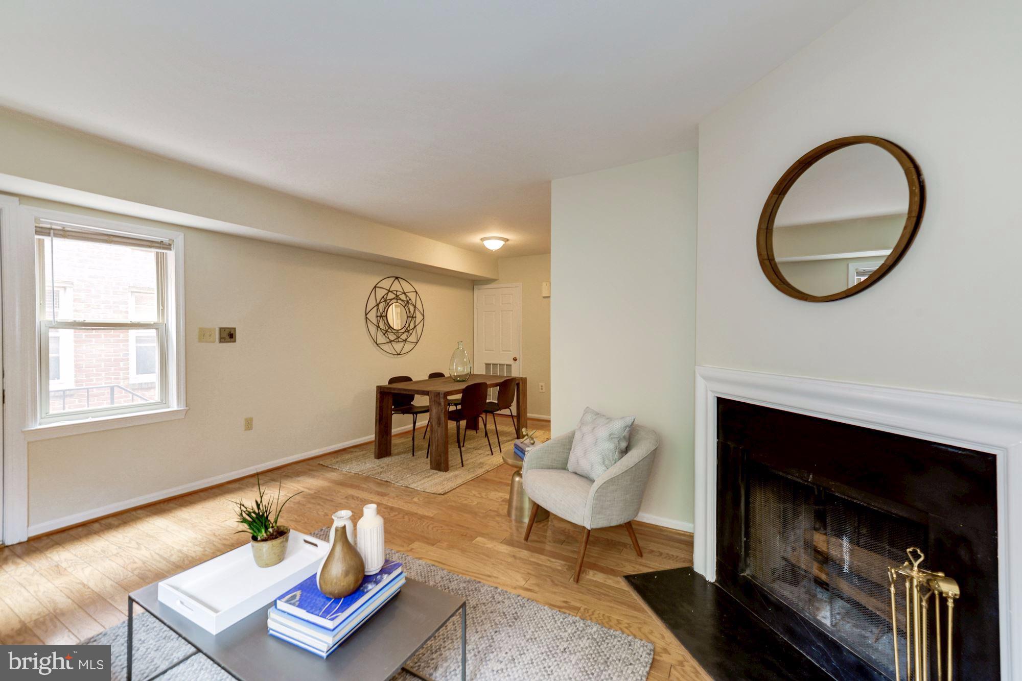 1477 A Street Northeast, Unit 1477 Washington, DC 20002 - Photo 6 of 27 Living room with working fireplace