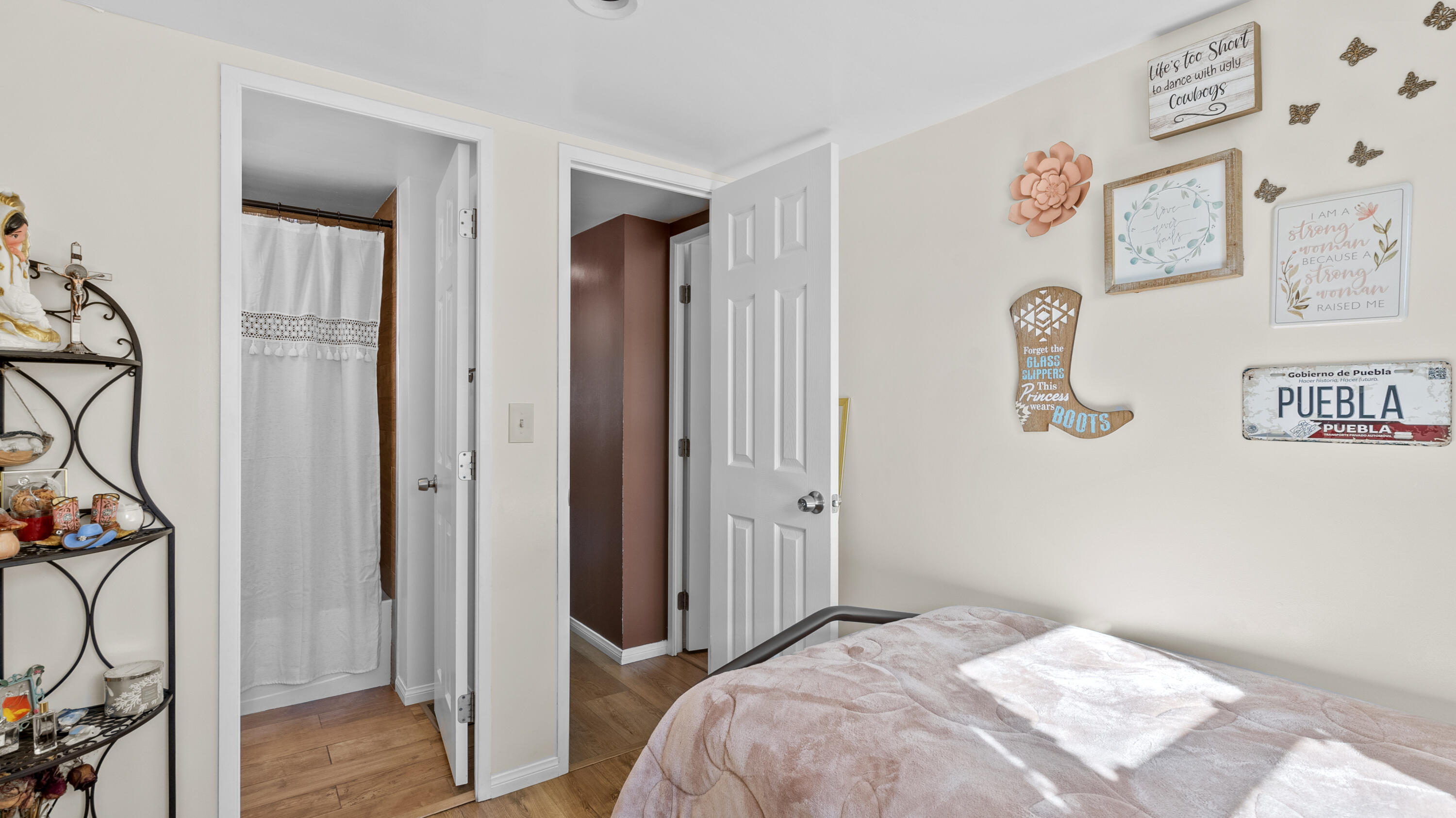 18035 Soledad Canyon Road Santa Clarita, CA 91387 - Photo 16 of 20 a bedroom with a bed and a view of bathroom