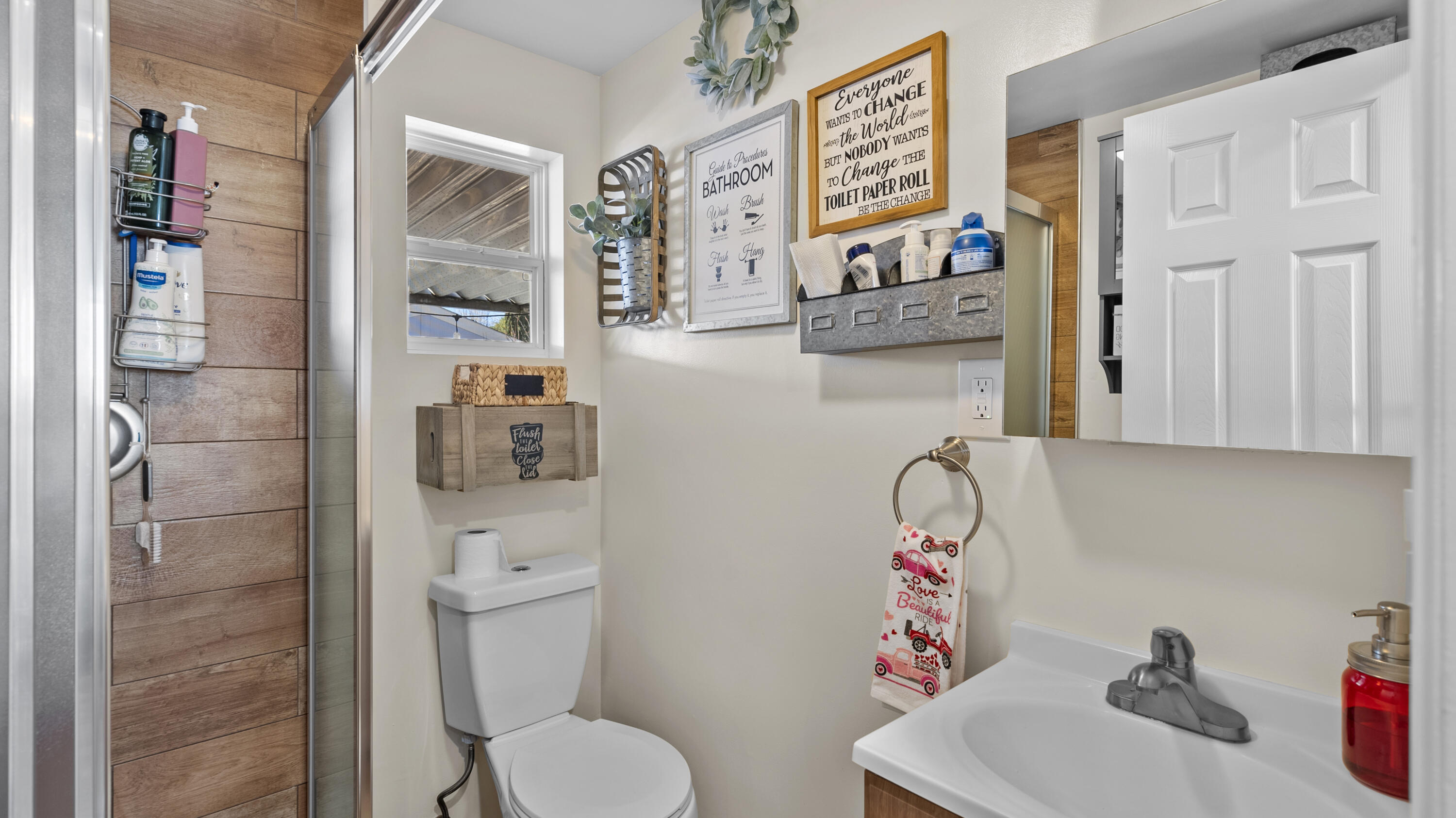18035 Soledad Canyon Road Santa Clarita, CA 91387 - Photo 20 of 20 a bathroom with a toilet and a sink