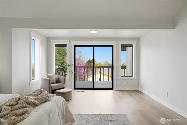 a spacious bathroom with a double vanity sink a toilet and a window