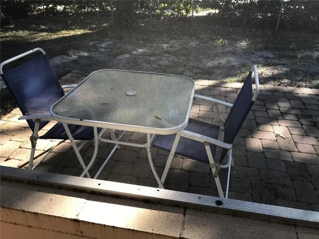 a black and white photo of a fireplace