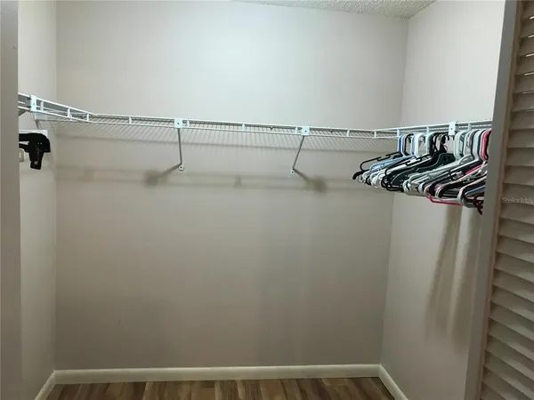 a view of a room with racks on the wall