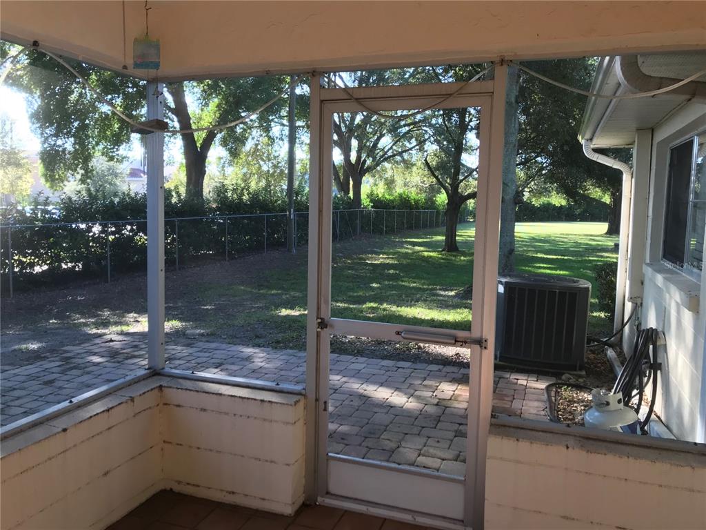 9257 Southwest 82nd Terrace, Unit H Ocala, FL 34481 - Photo 5 of 24 a view of a house with a from a balcony