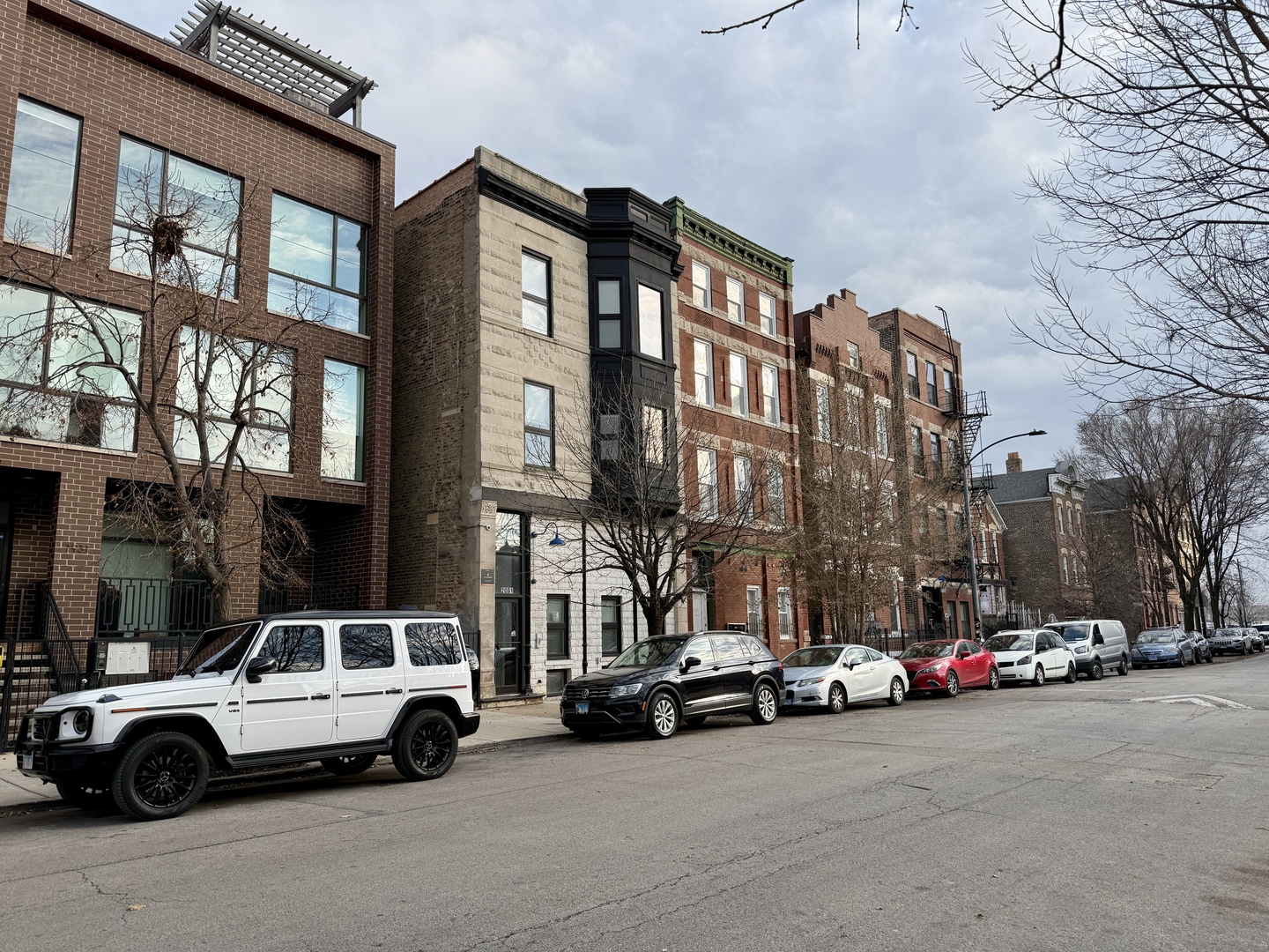2003 South Allport Street, Unit 1 Chicago, IL 60608 - Photo 1 of 15 a view of cars parked in front of a building