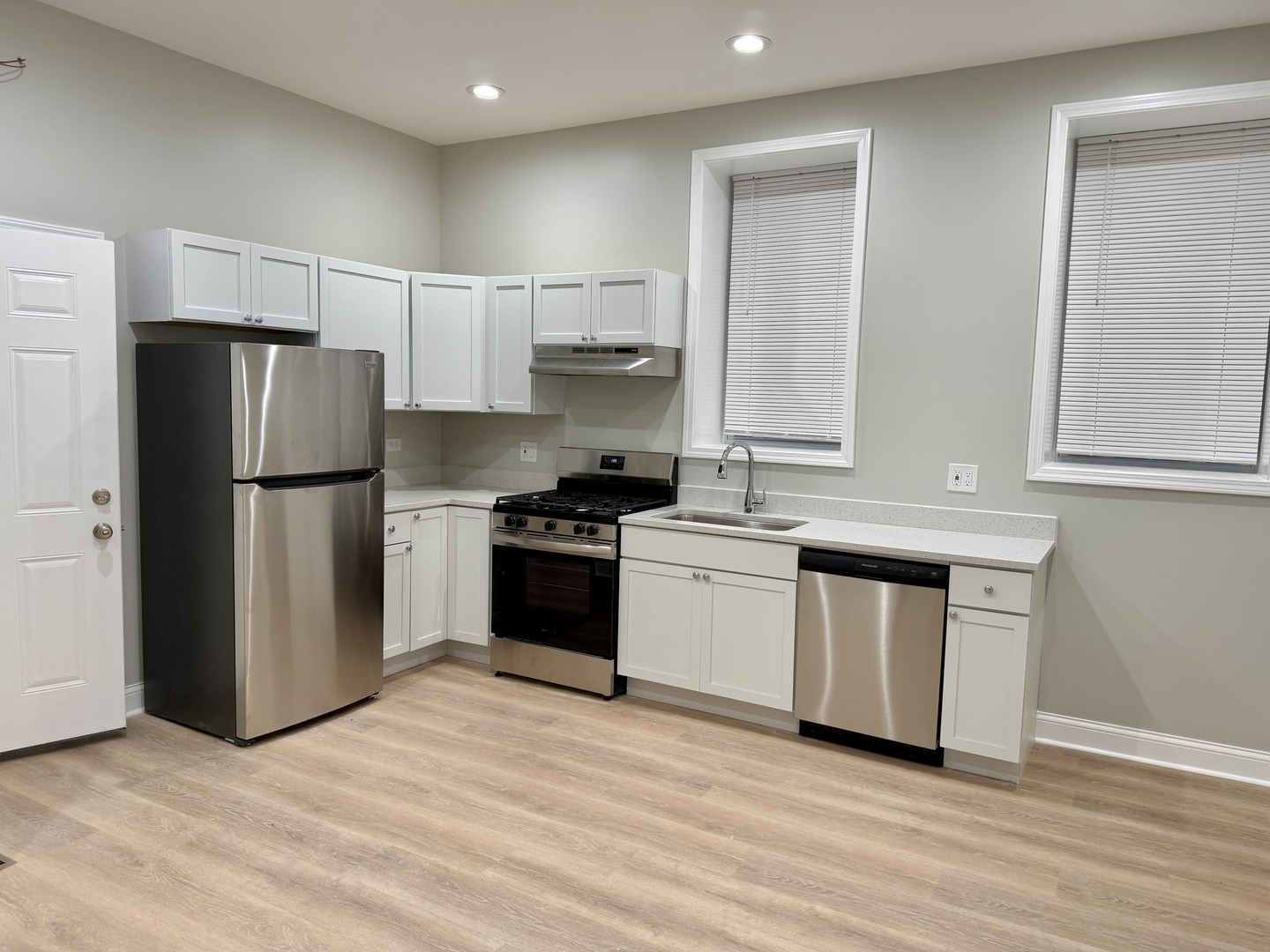 2003 South Allport Street, Unit 1 Chicago, IL 60608 - Photo 4 of 15 a kitchen with a refrigerator and a stove top oven