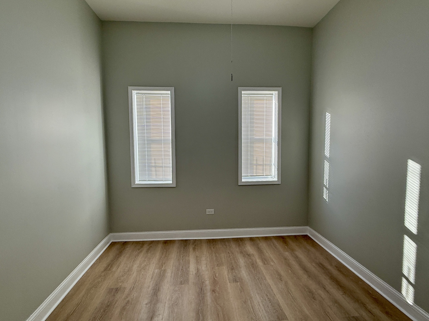 2003 South Allport Street, Unit 1 Chicago, IL 60608 - Photo 6 of 15 a view of a room with wooden floor and window