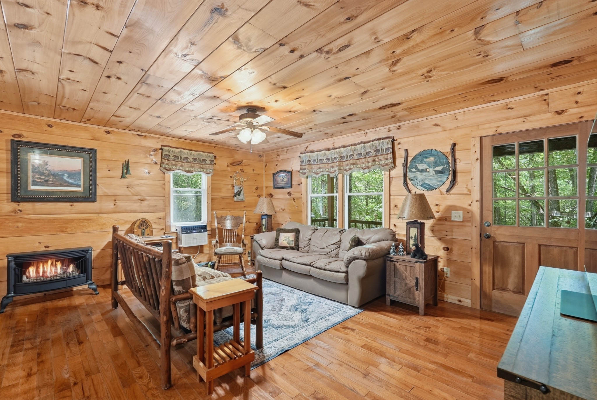 118 Cherokee Road Spencer, TN 38585 - Photo 5 of 85 a living room with furniture a fireplace and wooden floor
