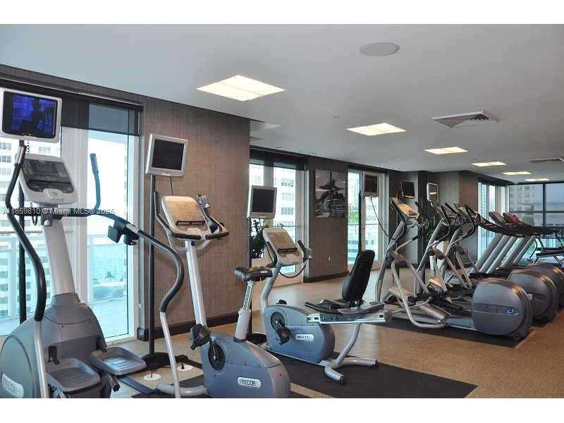 951 Brickell Avenue, Unit 3609 Miami, FL 33131 - Photo 19 of 25 a room with lots of gym equipment