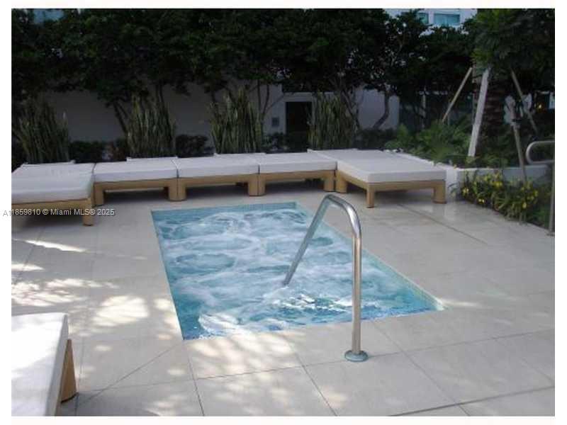 951 Brickell Avenue, Unit 3609 Miami, FL 33131 - Photo 22 of 25 a view of backyard with couches