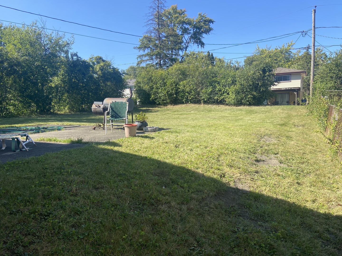1338 Jill Terrace Homewood, IL 60430 - Photo 13 of 15 a view of a swimming pool with a yard