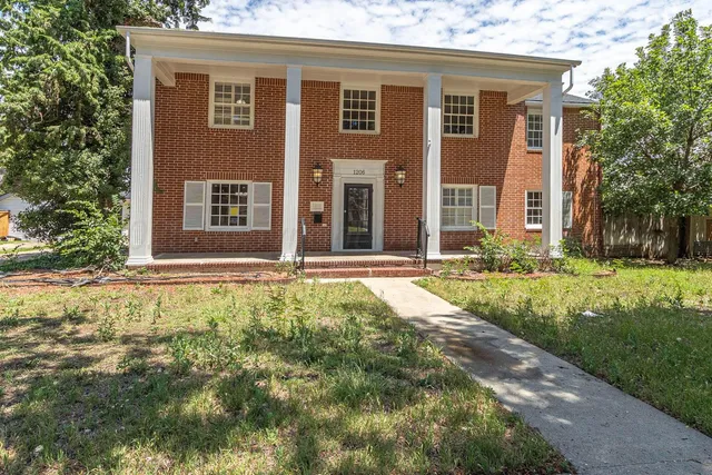 front view of house with a yard