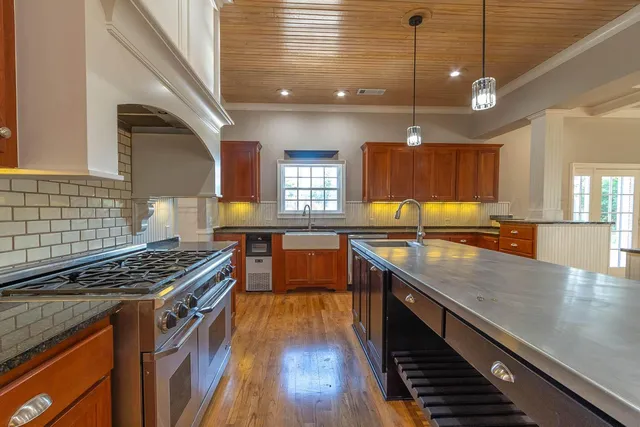 a kitchen with lots of counter space and a sink