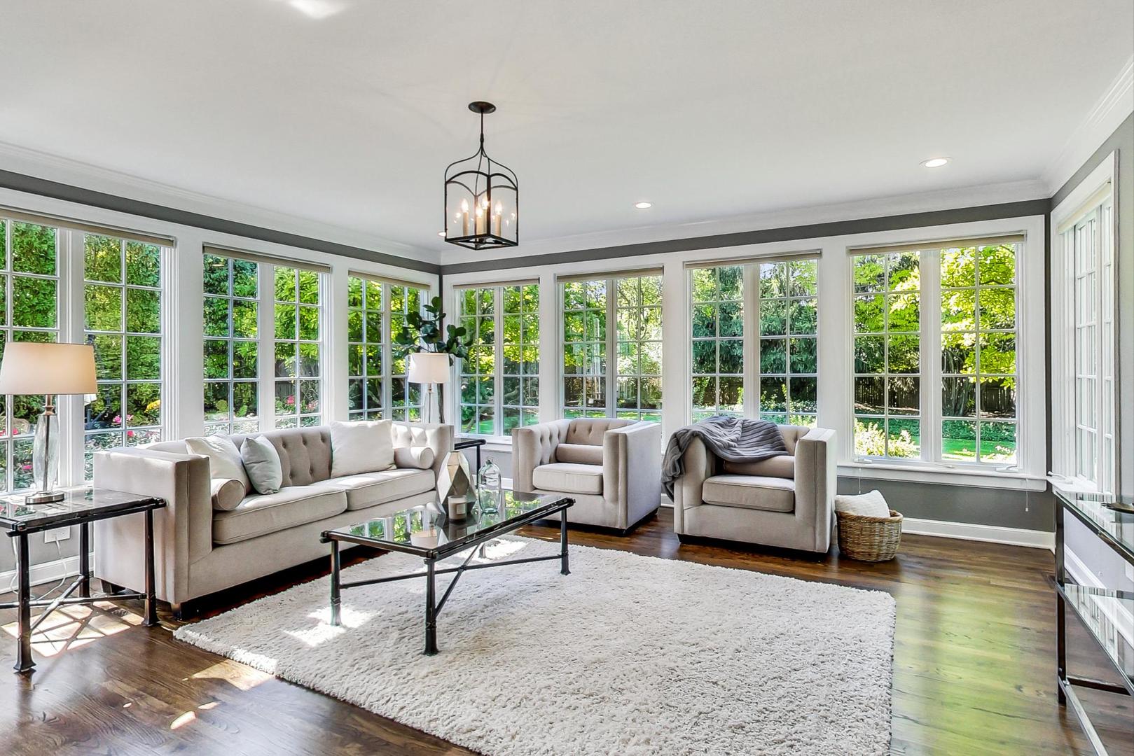 110 Sheridan Road Winnetka, IL 60093 - Photo 15 of 41 a living room with furniture and a large window