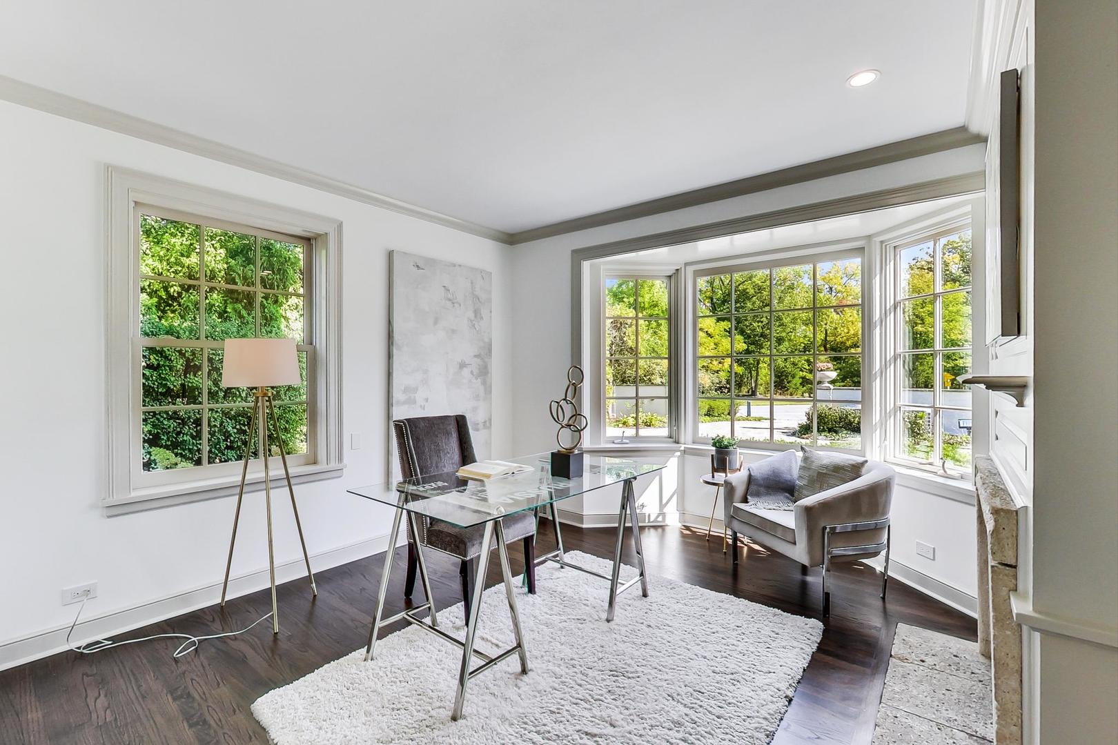110 Sheridan Road Winnetka, IL 60093 - Photo 17 of 41 a living room with furniture and a large window