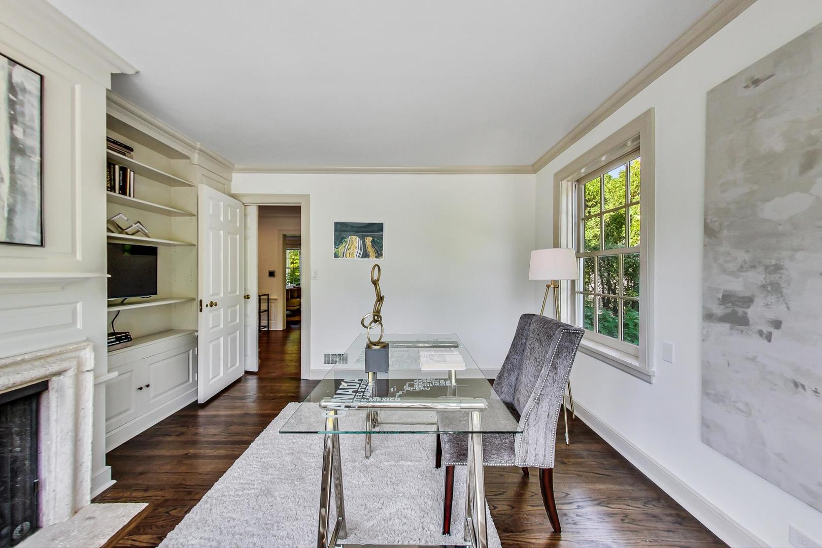 110 Sheridan Road Winnetka, IL 60093 - Photo 18 of 41 a view of a dining room with furniture window and wooden floor