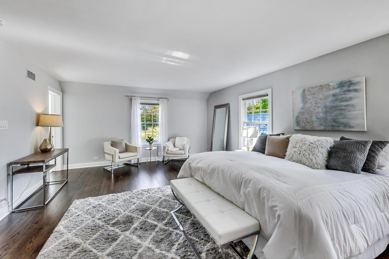 110 Sheridan Road Winnetka, IL 60093 - Photo 21 of 41 a bed room with a bed and a couch