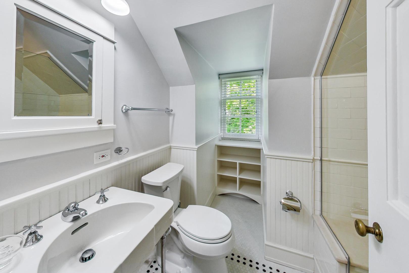 110 Sheridan Road Winnetka, IL 60093 - Photo 35 of 41 a bathroom with a sink toilet and mirror