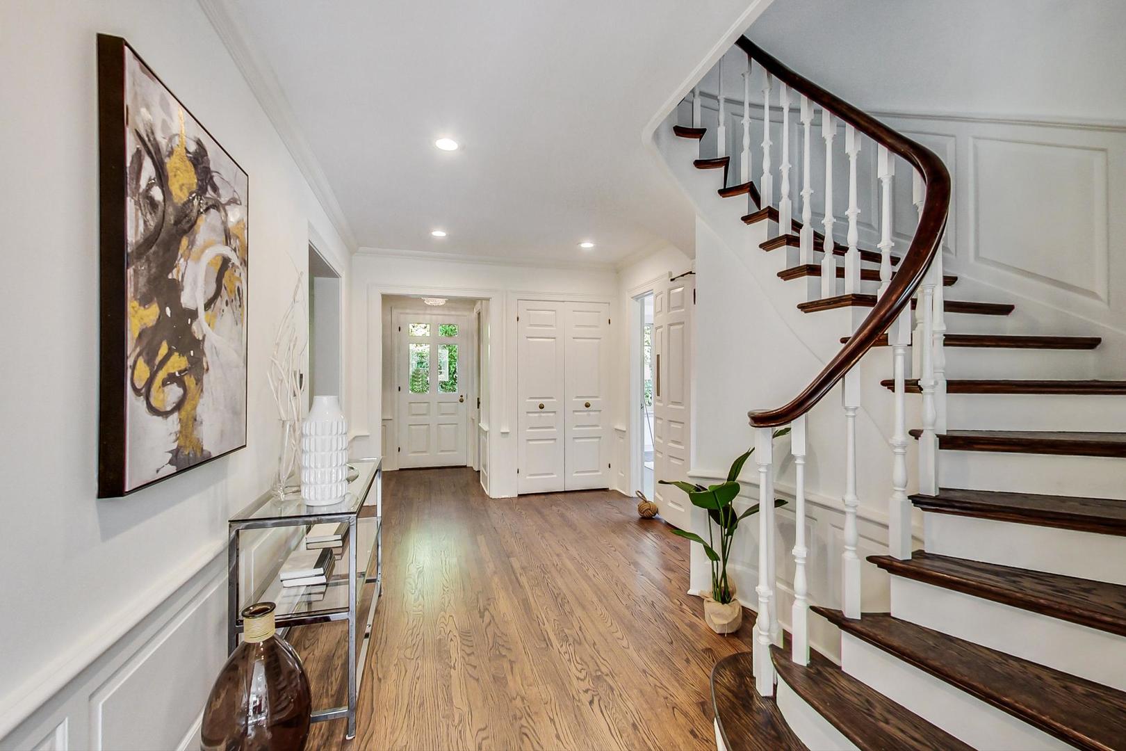 110 Sheridan Road Winnetka, IL 60093 - Photo 5 of 41 a view of entryway with wooden floor