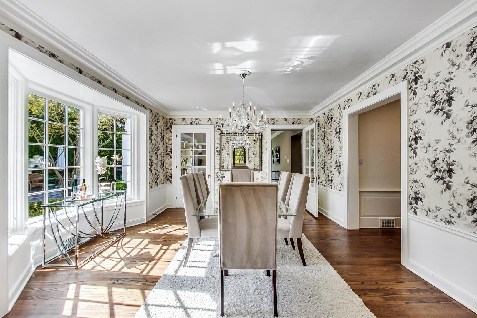 110 Sheridan Road Winnetka, IL 60093 - Photo 8 of 41 a view of a dining room with furniture window and wooden floor