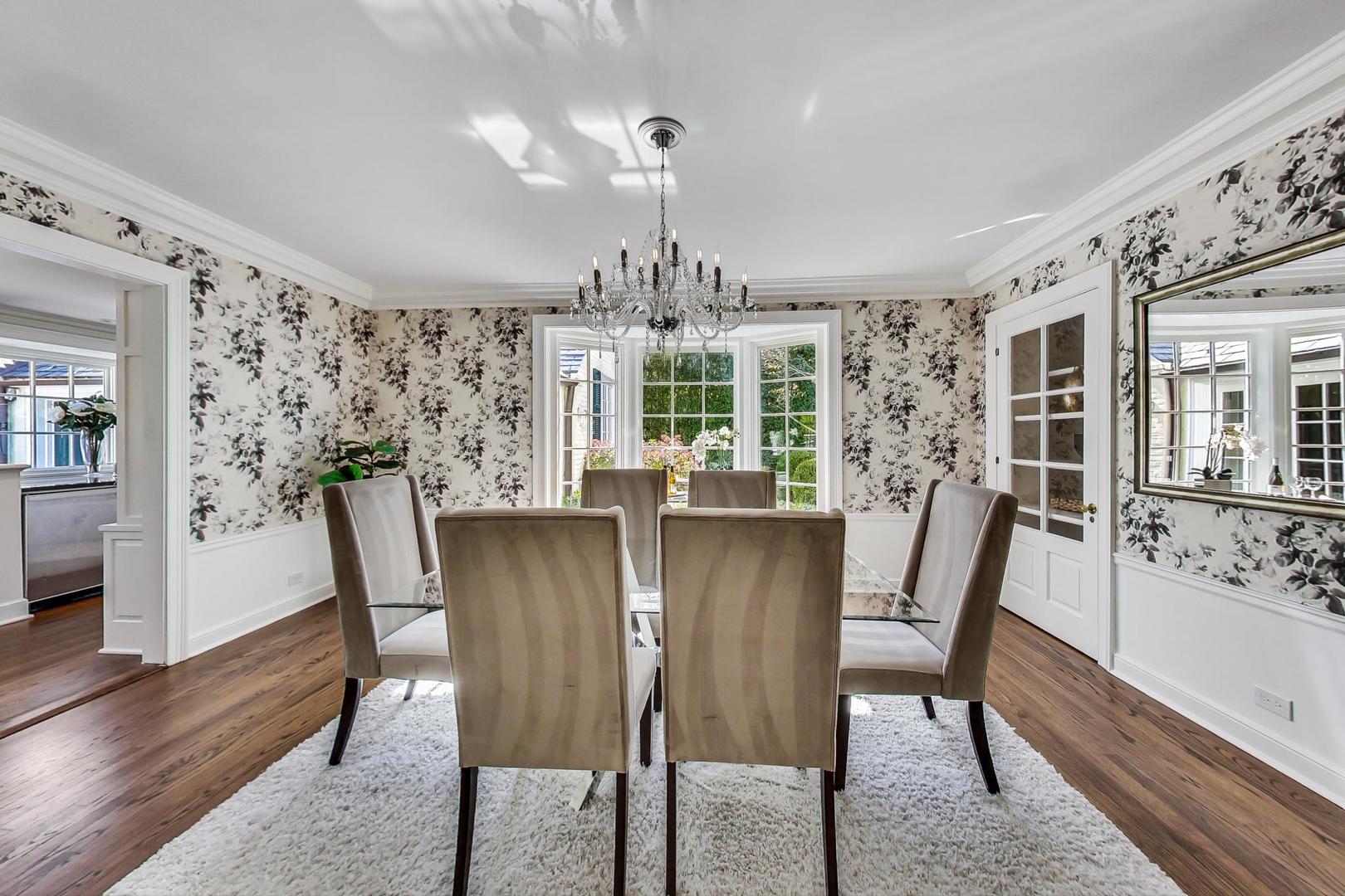 110 Sheridan Road Winnetka, IL 60093 - Photo 9 of 41 a view of a dining room with furniture window and wooden floor