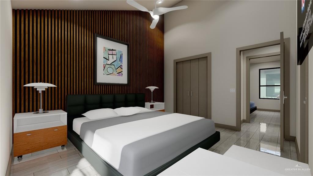 308 Love Drive Edcouch, TX 78538 - Photo 11 of 13 a bedroom with a bed and a dresser with mirror