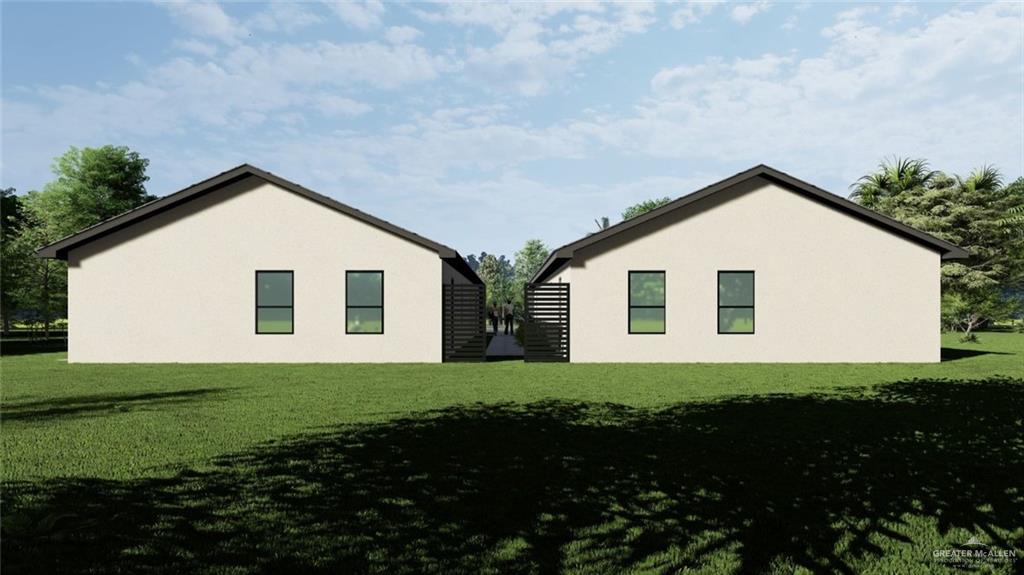 308 Love Drive Edcouch, TX 78538 - Photo 4 of 13 a front view of house with a garden