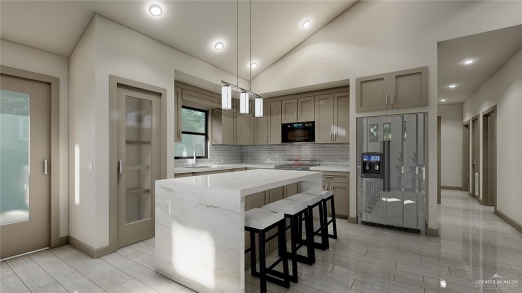 308 Love Drive Edcouch, TX 78538 - Photo 7 of 13 a kitchen with cabinets and refrigerator