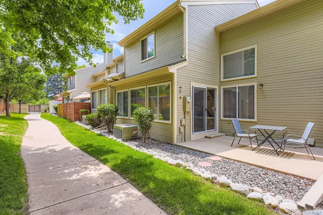 a front view of house with yard and seating