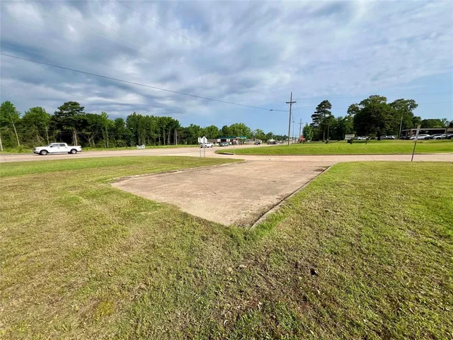 a view of a garden and basketball court