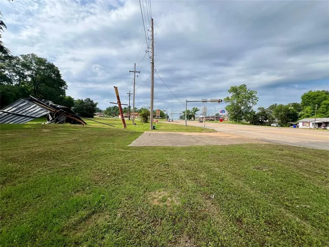 a view of a garden with a building