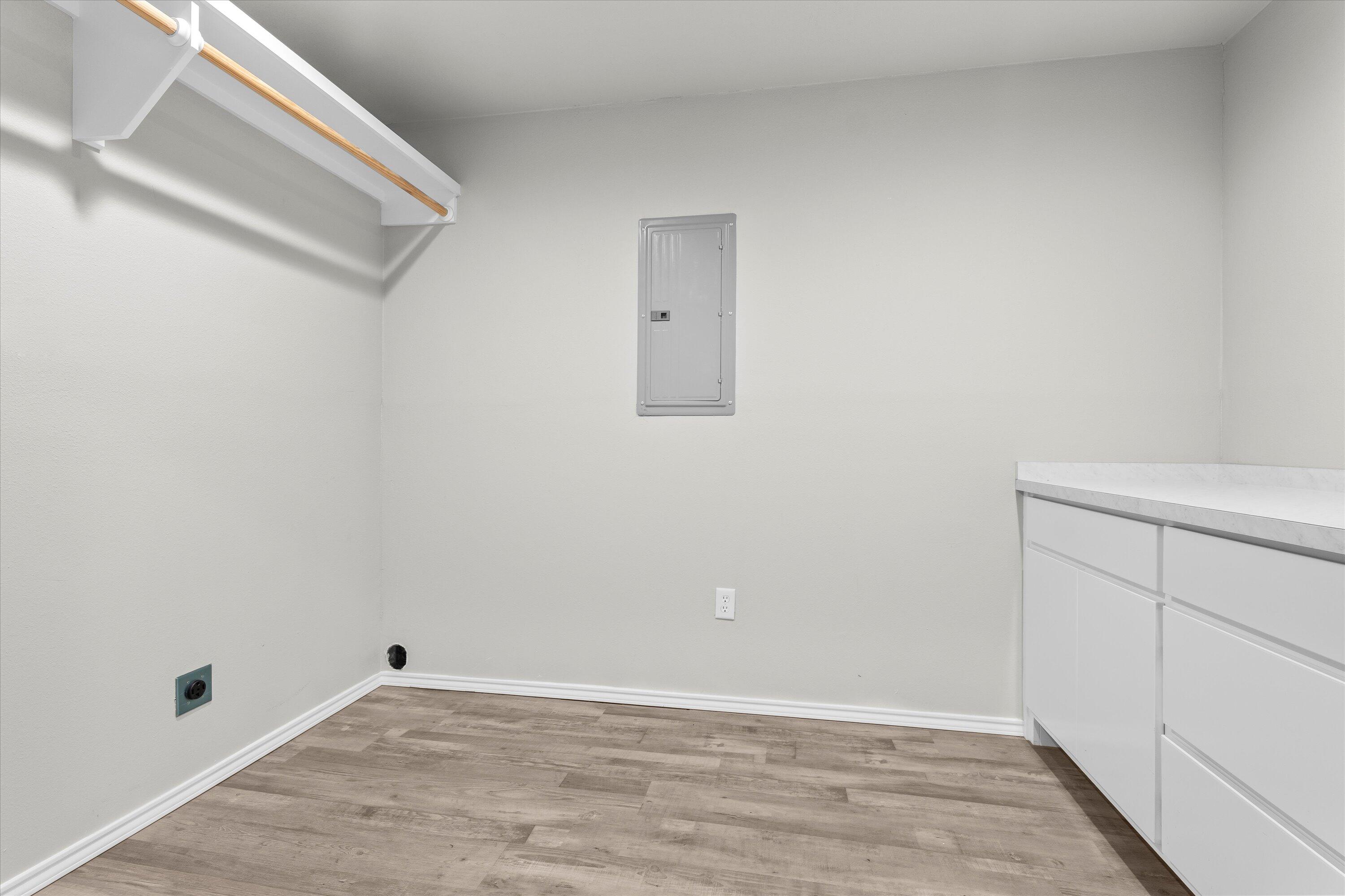 327 Hiracheta Drive New Home, TX 79381 - Photo 23 of 26 a view of a room with wooden floor