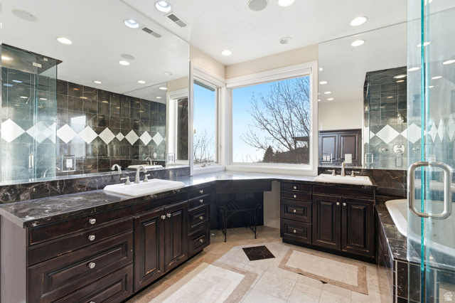 1878 East Ridge Point Drive Bountiful, UT 84010 - Photo 26 of 92 Bathroom with a stall shower, two vanities, recessed lighting, a garden tub, and light tile patterned flooring