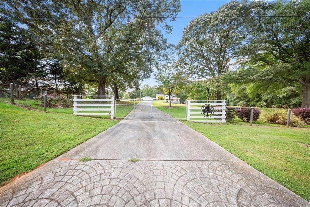 195 Sims Farm Way Maysville, GA 30558 - Photo 3 of 58 a view of a park with large trees