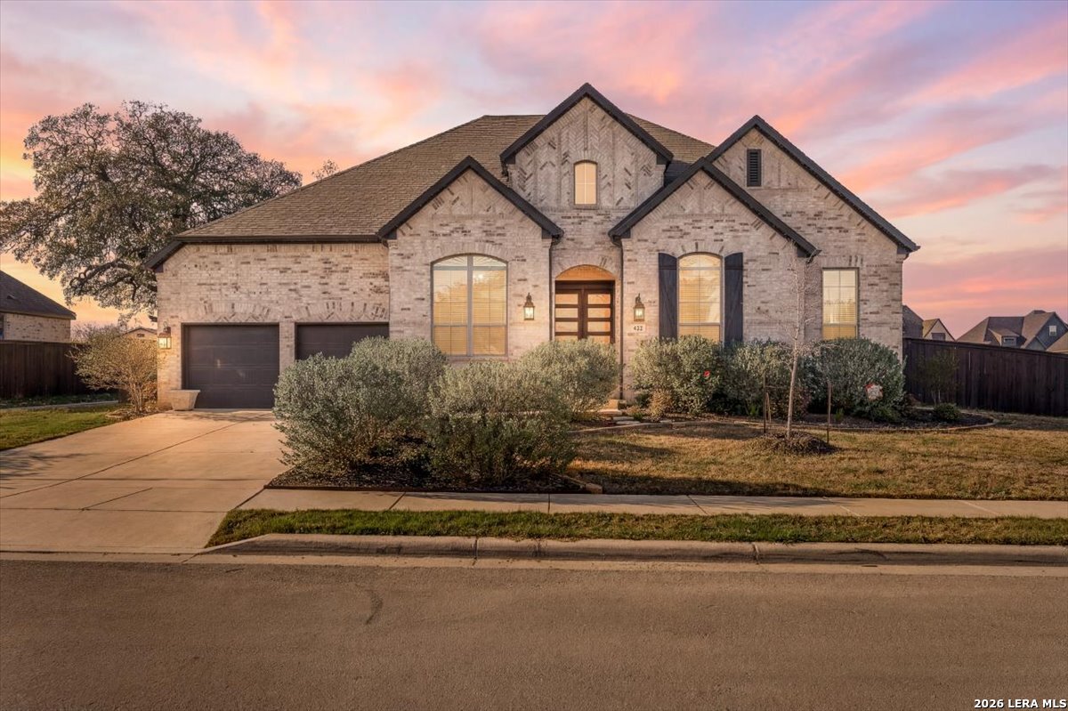 421 Corwin Springs Cibolo, TX 78108 - Photo 1 of 42 a front view of a house with a yard