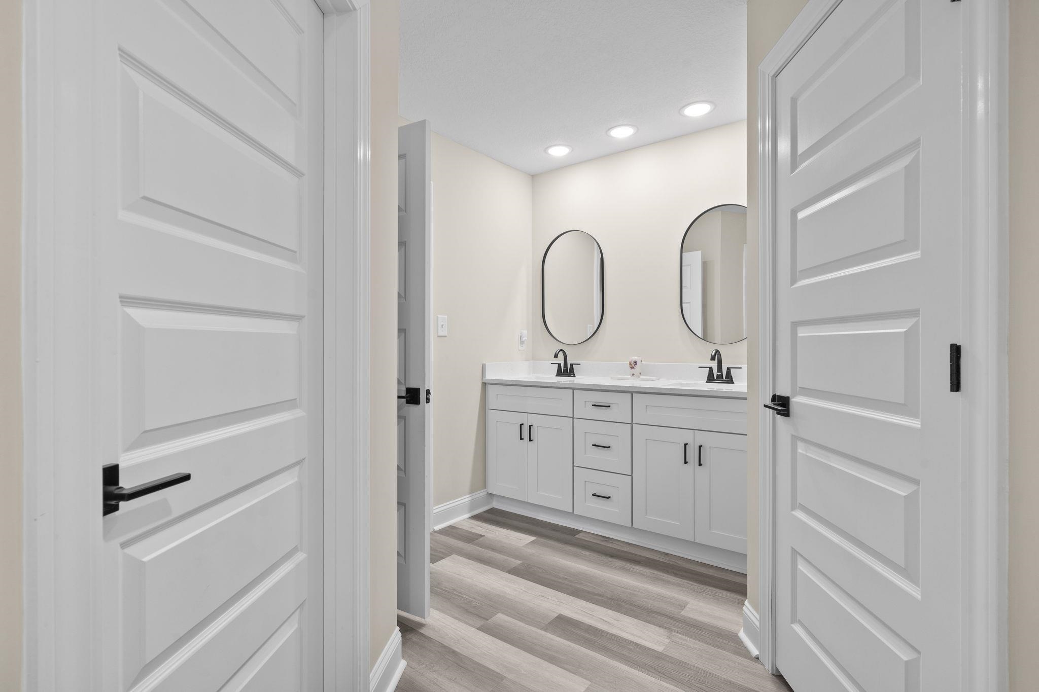 3394 Dusty Road Loris, SC 29569 - Photo 12 of 37 Bathroom featuring double vanity, light wood-type flooring, and recessed lighting