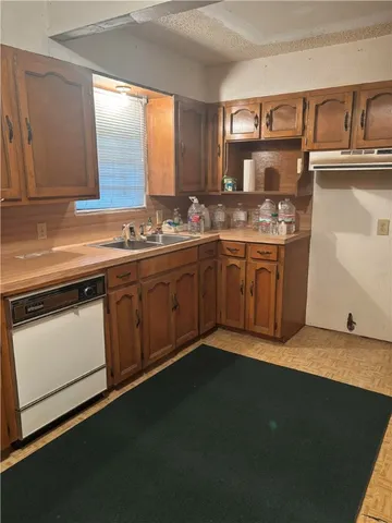 a view of a room with a fireplace