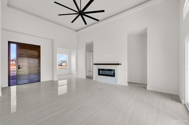 2309 Trinity Avenue McAllen, TX 78504 - Photo 14 of 31 a view of an empty room and window with a fireplace