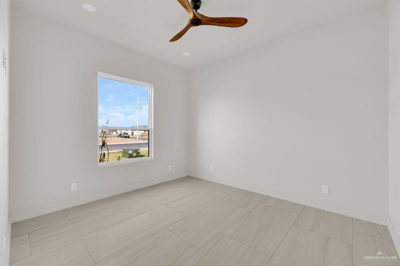 2309 Trinity Avenue McAllen, TX 78504 - Photo 15 of 31 a view of an empty room with a window