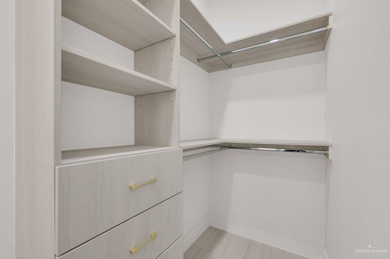 2309 Trinity Avenue McAllen, TX 78504 - Photo 18 of 31 a view of an empty walk in closet