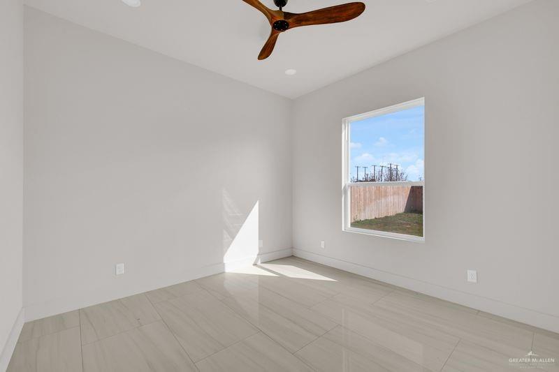 2309 Trinity Avenue McAllen, TX 78504 - Photo 19 of 31 a view of an empty room with a window