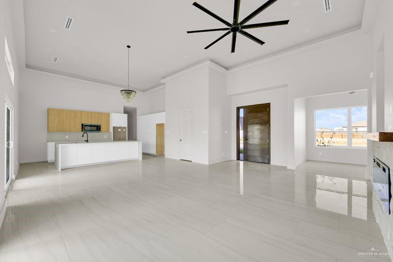 2309 Trinity Avenue McAllen, TX 78504 - Photo 5 of 31 a view of a livingroom with furniture and window