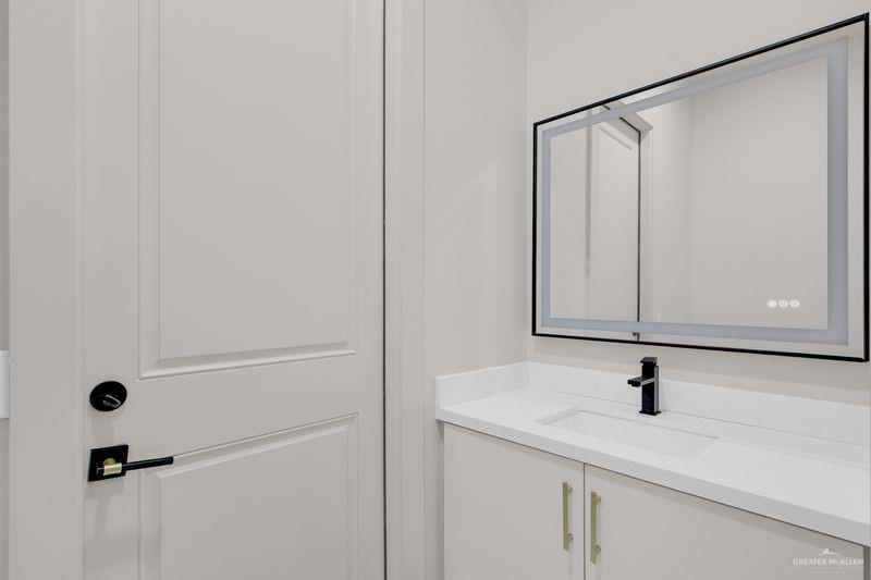 2309 Trinity Avenue McAllen, TX 78504 - Photo 9 of 31 a bathroom with a sink