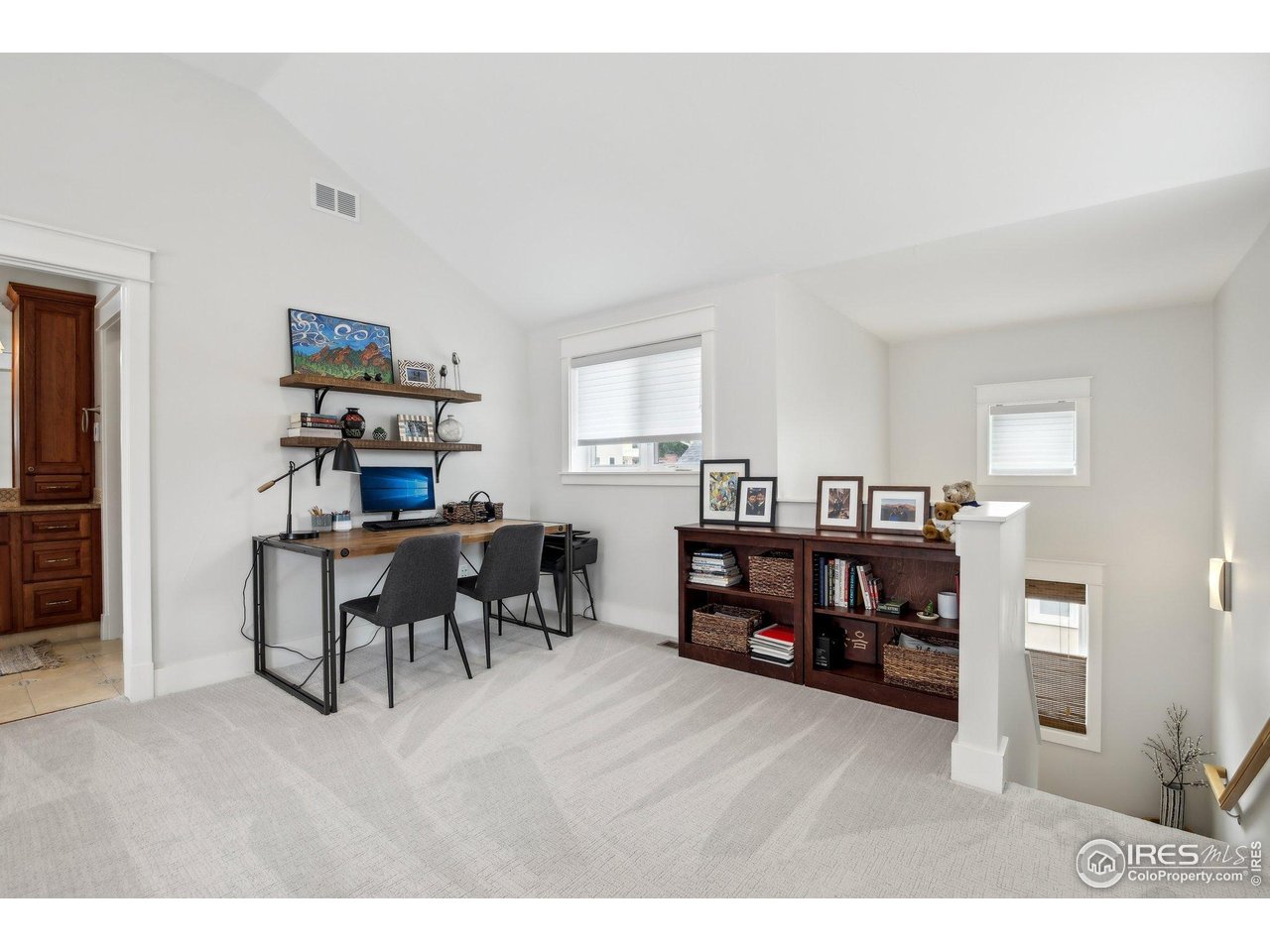 2917 13th Street Boulder, CO 80304 - Photo 17 of 40 a living room with furniture and a dining table
